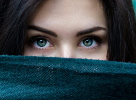 a close up of a person with blue eyes