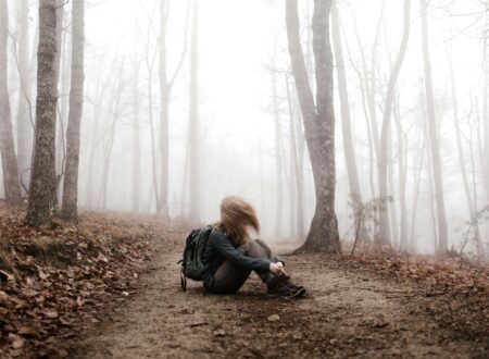 woman sitting on land