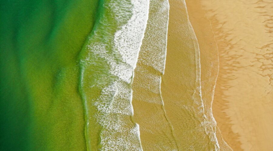 a bird's eye view of a sandy beach