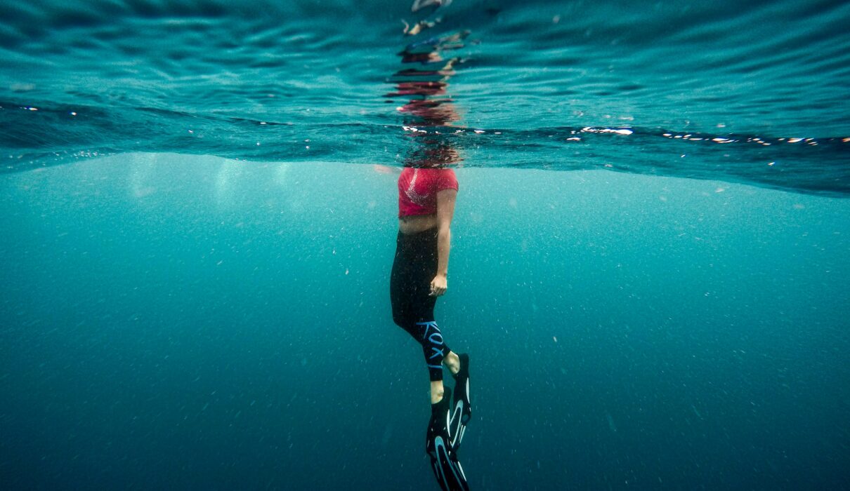 photography of person under water