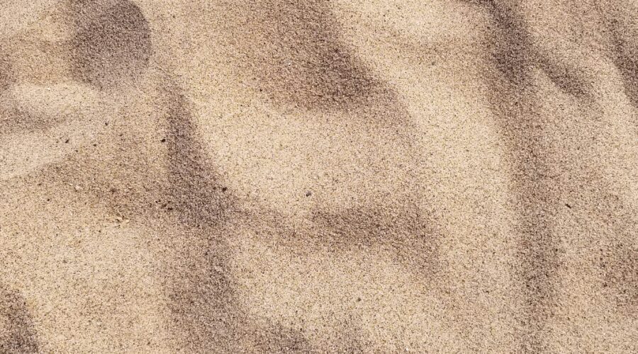 focus photo of brown sand