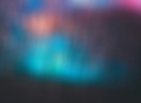 a blurry image of a blue and pink background