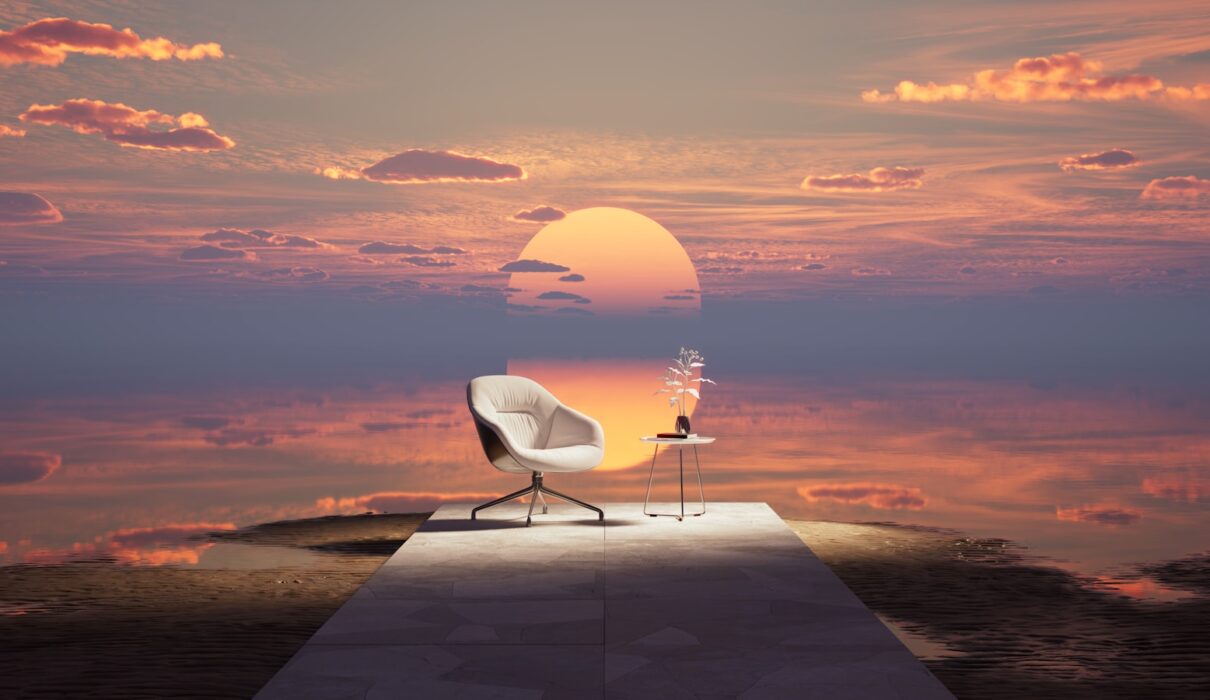 a white chair sitting on top of a wooden platform