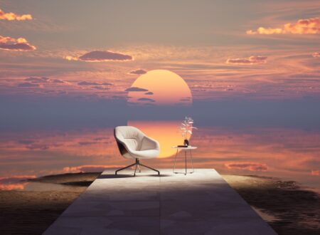 a white chair sitting on top of a wooden platform